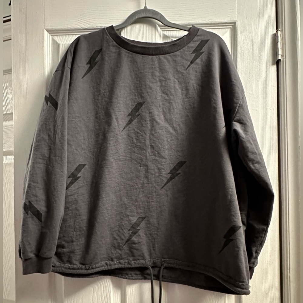 large pullover with lightening bolts